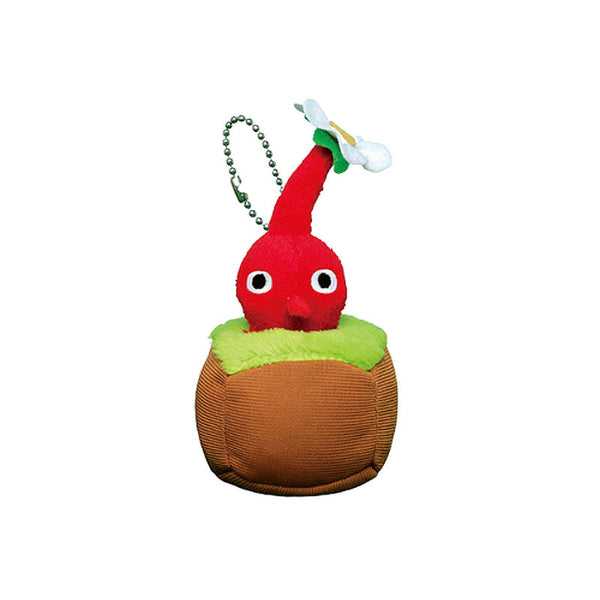 Red plush pikmin in a plush dirt and grass base.