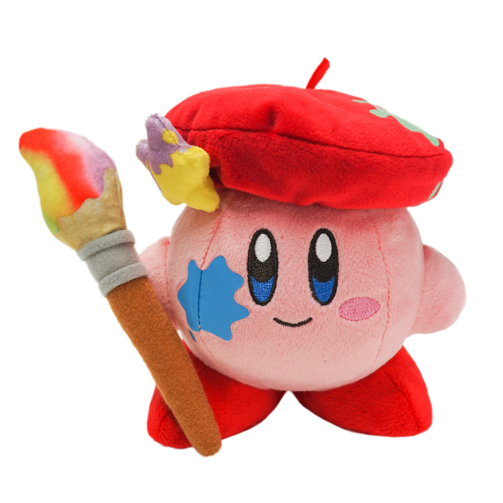 A plushie of a pink kirby with a blue paint splash on his face. He is wearing a red beret with a green paint splash on it, and holding a paintbrush with multicolor paint on it.