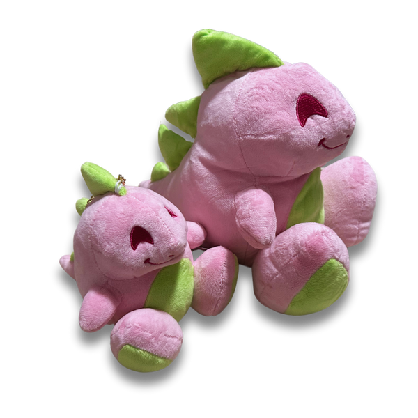 A side by side of the two sizes of pink dinosaur plush to show scale.