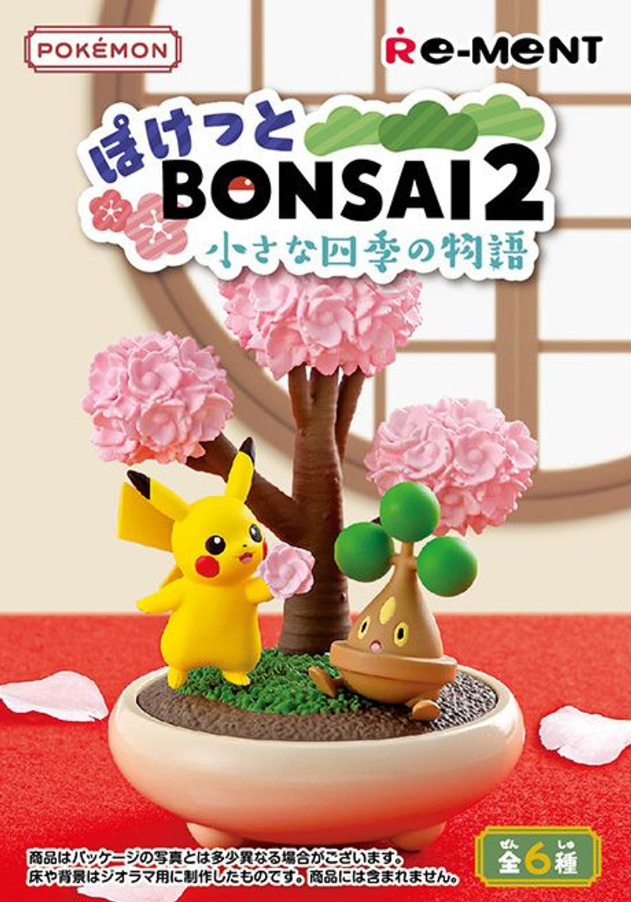 The packaging for one Re-Ment Pokemon bonsai box. It features Pikachu and Bonsly under a cherry blossom tree on the front of the box.