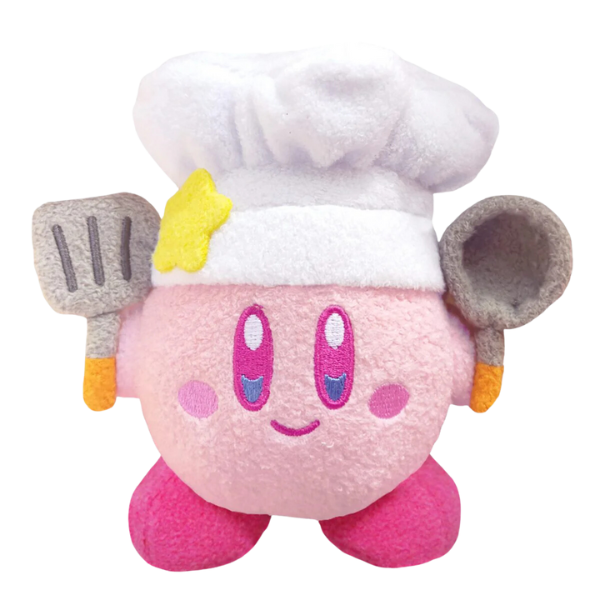 A super fuzzy kirby plushie wearing a chef hat and holding a spatula and frying pan. His facial details are nicely embroidered and he's smiling.