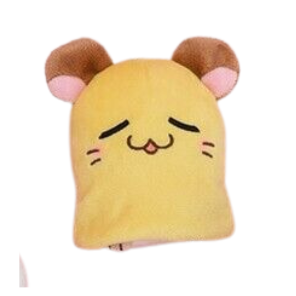 Sleeping hamster plushie wearing a yellow sheet with two brown ears poking out.