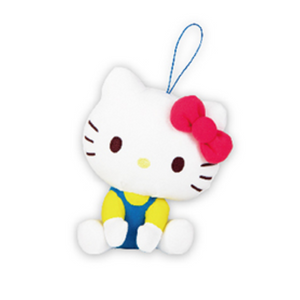 Hello Kitty wearing a yellow shirt and blue overalls with her classic red bow. Her head is cocked slightly and she's in a seated pose.