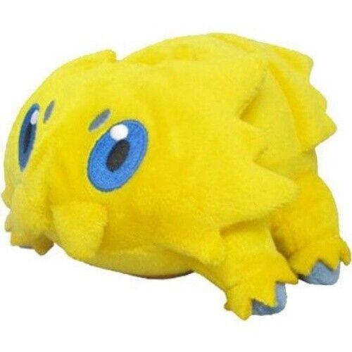 A yellow joltik plushie with blue embroidered eyes and grey-blue feet.