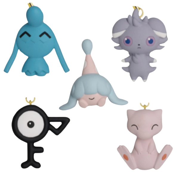 An image of all five psychic type pokemon keychains. In the top left is Wynaut, top right is Espurr, bottom right is Mew, bottom left Unown, and middle Hatenna.