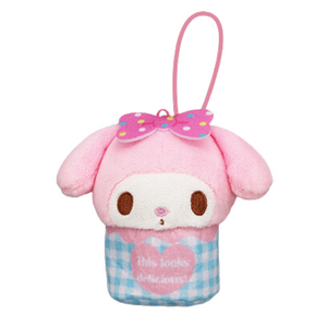 A mini plush of My Melody in an ice cream cup. The cup is a blue and white gingham with a heart that says "this looks delicious". She has a polka dot pink bow on her head and her face has nice embroidered details.