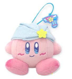 Plush kirby with a towel wrapped around his head and a small hair dryer felt charm.