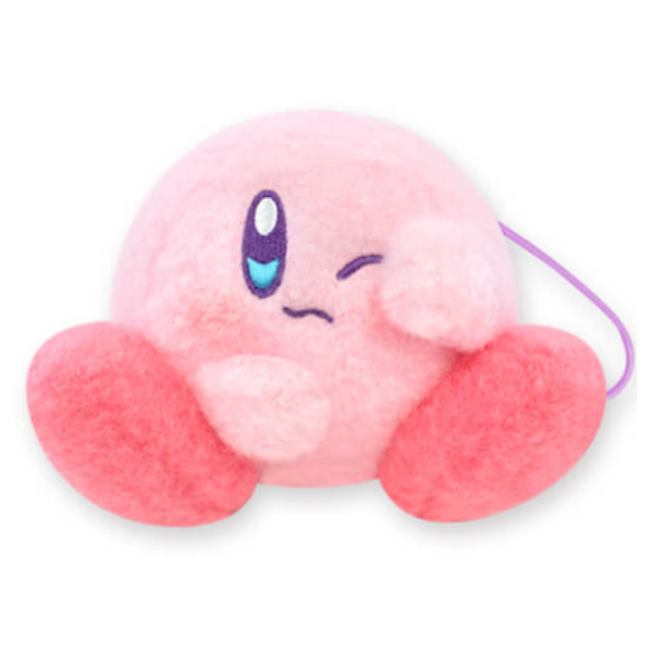 A sleepy Kirby rubbing one eye like he's just woken up from a nap. He has a woolly texture and is in a seated position.