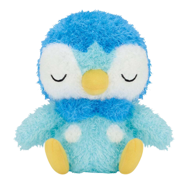 An extra fluffy sleeping Piplup plush made of super fuzzy fabric. He's in a seated position and both eyes are closed like he's sleeping.