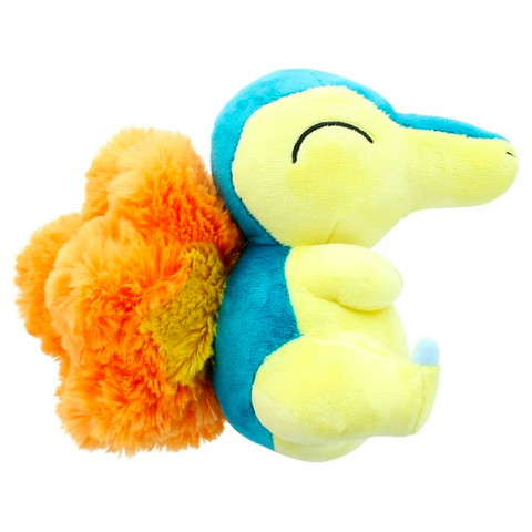 A soft plushie of cyndaquil. His eyes are closed in a happy half-moon position. The fire on his back is orange and yellow and super fluffy.