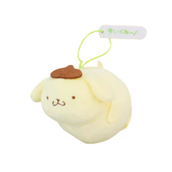 A small pompompurin plush laying on his stomach with a content look on his face. His face is nicely embroidered.