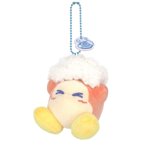 A slightly pastel colored waddle dee plush with his eyes closed, rubbing fluffy plush "bubbles" on his head. There's a ball chain attached to the top of the plush with a felt soap charm.