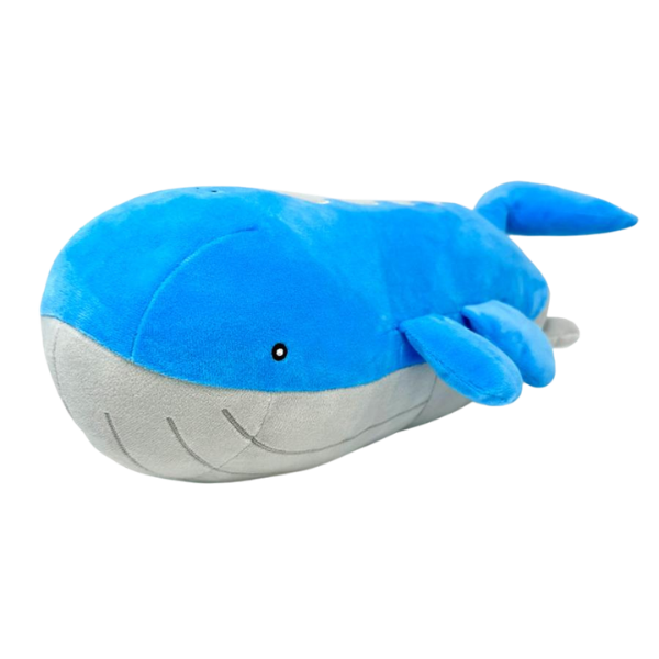 A large soft Wailord plush made of a soft cerulean blue fabric with light grey fabric for the belly. His face and belly details are nicely embroidered.