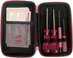 An image showing the inside of the bootleg buddy. It is a black case with pink zippers. On the left you can see the bootleg buddy companion cards, which give information on spotting bootleg games. On the right are the four screwdrivers included in the set. All four screwdrivers are pink.