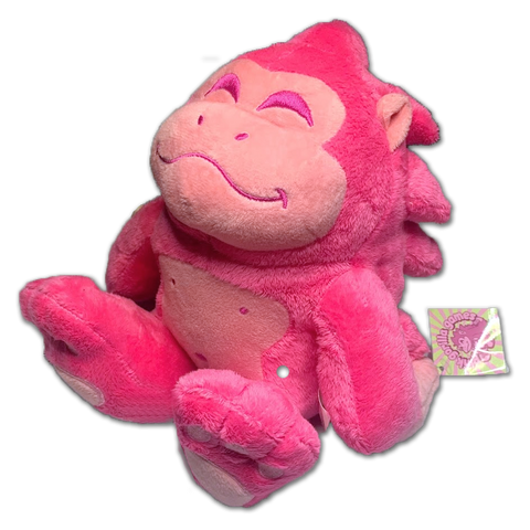 A Pink Gorilla plushie, 3 quarters view. The plush has bright pink fur with a light pink face, stomach, hands, and toes. Facial features are stitched in bright pink thread.